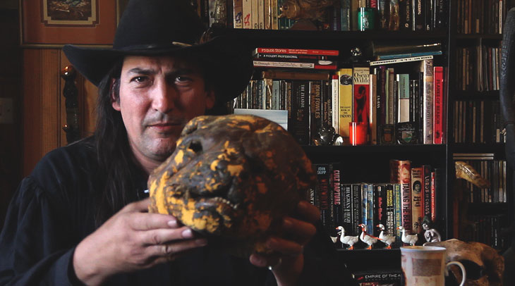 Richard Stanley, holding the Dog Man mask he used to sneak his way onto the set of The Island of Dr Moreau after he was fired